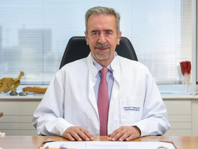 Dr. Ioannis Tsarouhas, Orthopedic Surgeon, in his practice