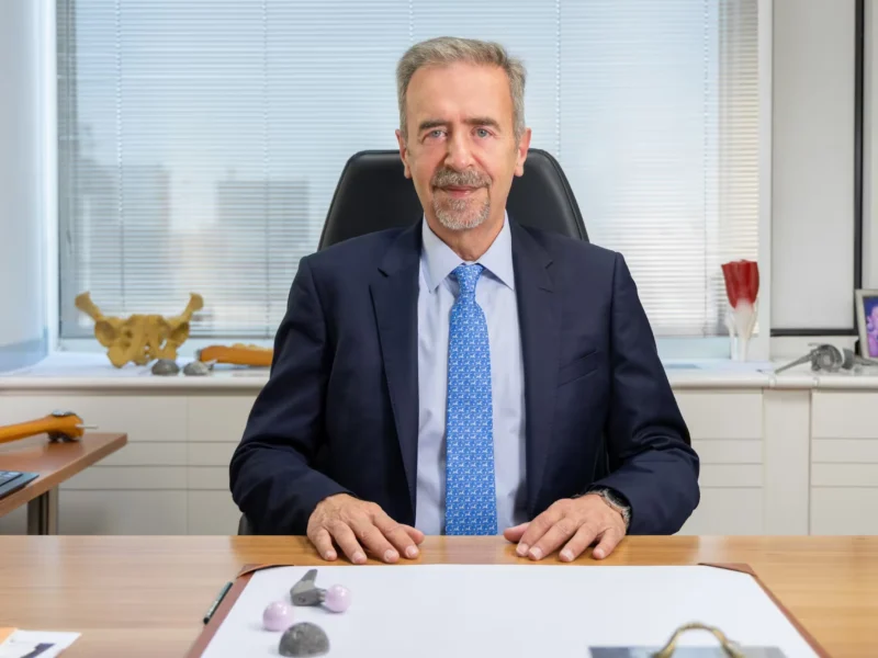 Dr. Ioannis Tsarouhas, Orthopedic Surgeon, in his office